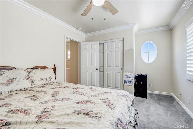 bedroom with ornamental molding, carpet floors, ceiling fan, and a closet