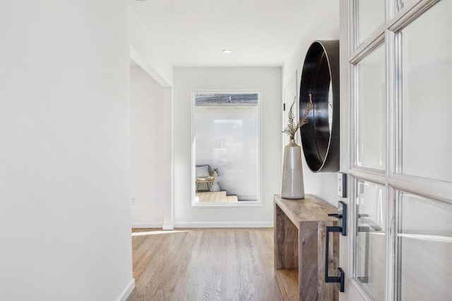 hall featuring light hardwood / wood-style flooring