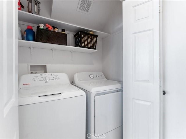 laundry room with washer and dryer