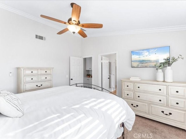 bedroom with lofted ceiling, ornamental molding, light colored carpet, and ceiling fan