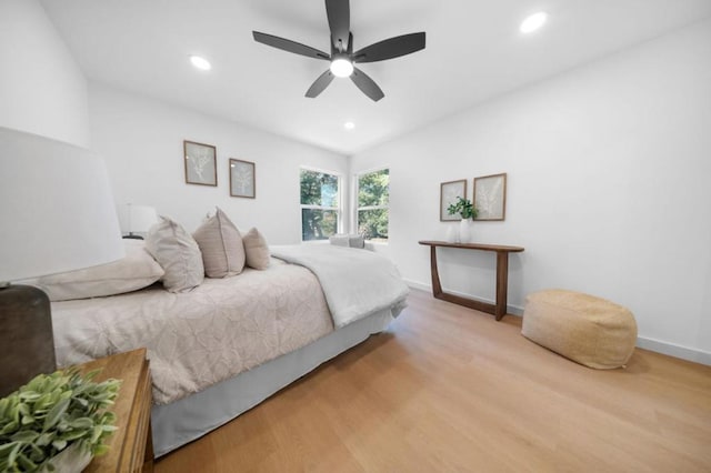 bedroom featuring light hardwood / wood-style flooring and ceiling fan