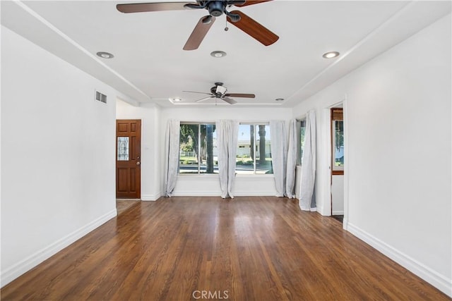 unfurnished room featuring dark hardwood / wood-style floors