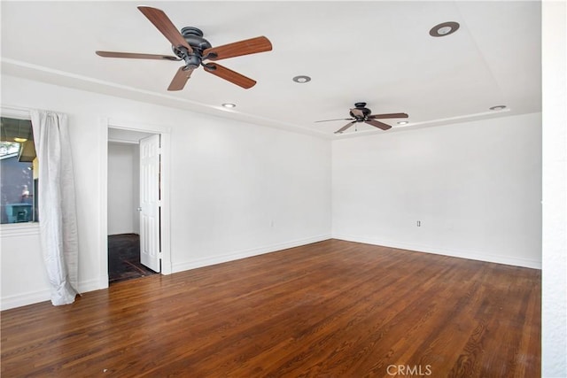 unfurnished room featuring dark hardwood / wood-style flooring