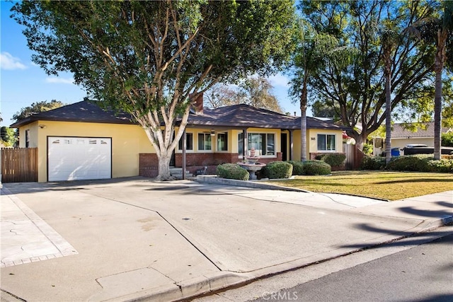 single story home featuring a garage