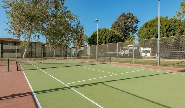 view of tennis court with basketball court