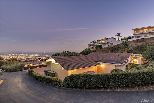 view of property exterior at dusk