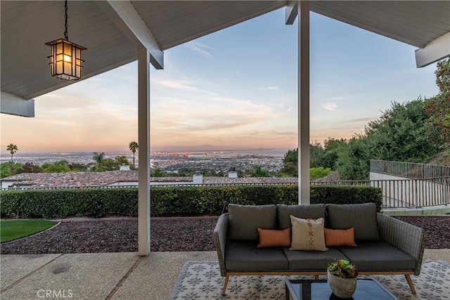 patio terrace at dusk with an outdoor living space