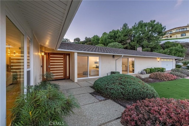 exterior space with a garage