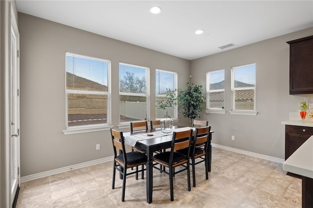 dining space featuring recessed lighting, baseboards, and visible vents