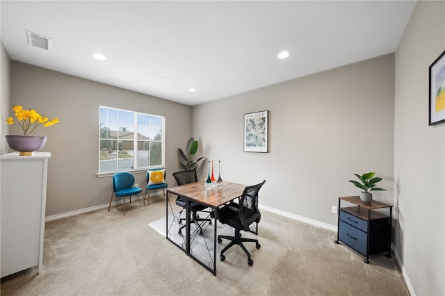 carpeted home office featuring baseboards, visible vents, and recessed lighting