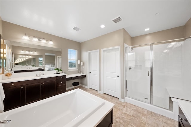 bathroom with vanity and plus walk in shower