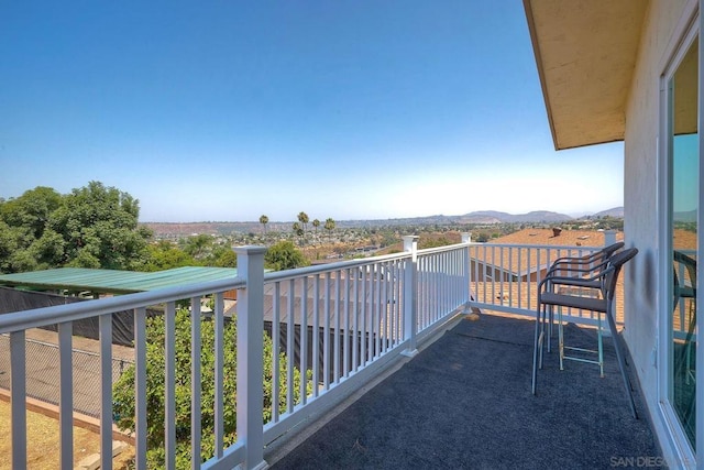 balcony featuring a mountain view