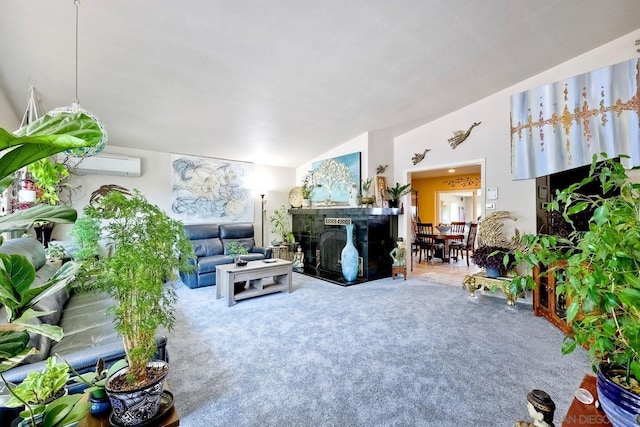 living room featuring lofted ceiling, an AC wall unit, and carpet