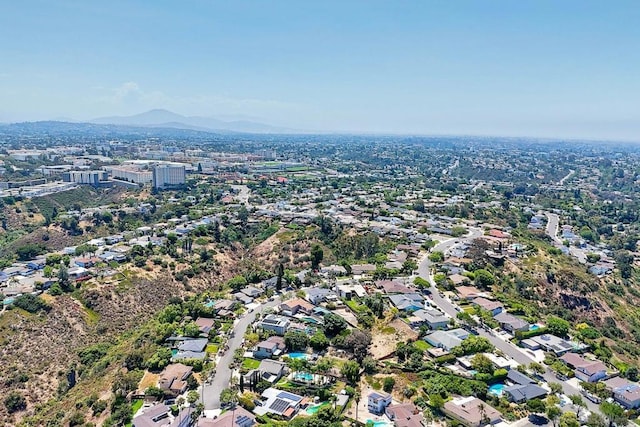 birds eye view of property featuring a mountain view