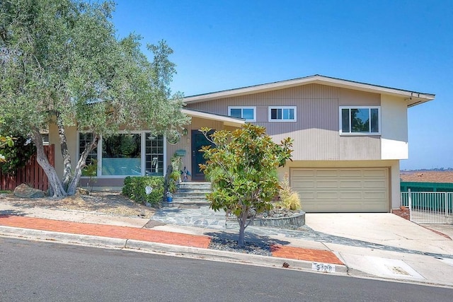 view of front of property featuring a garage