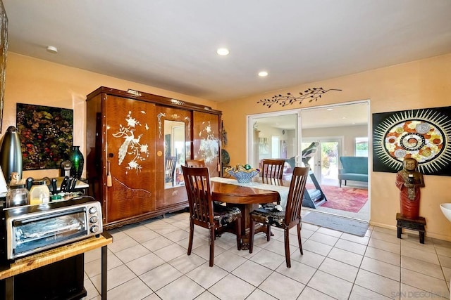 view of tiled dining space