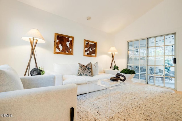 living room with vaulted ceiling