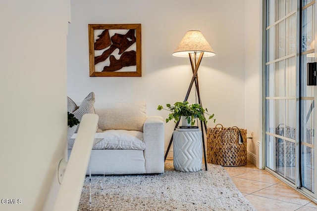 living area featuring light tile patterned flooring