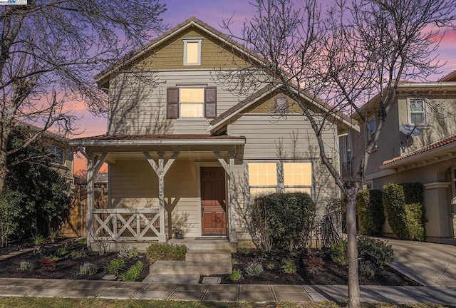 view of front of property featuring covered porch