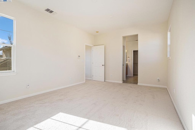 view of carpeted spare room