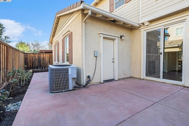 exterior space featuring central AC unit