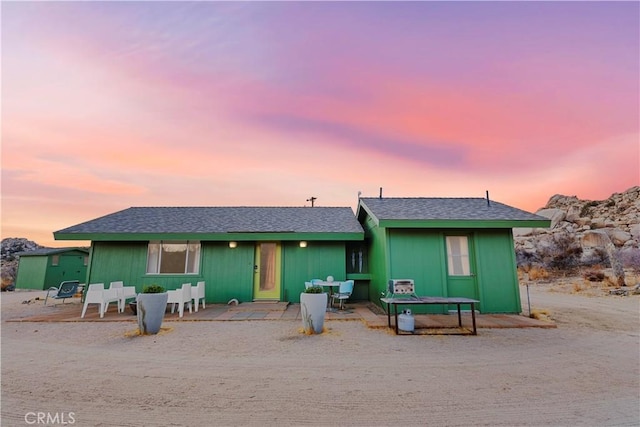 single story home with a patio