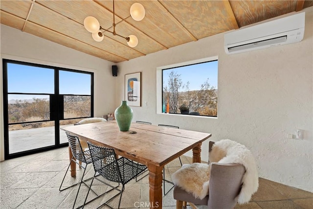 dining area featuring lofted ceiling, wooden ceiling, and an AC wall unit