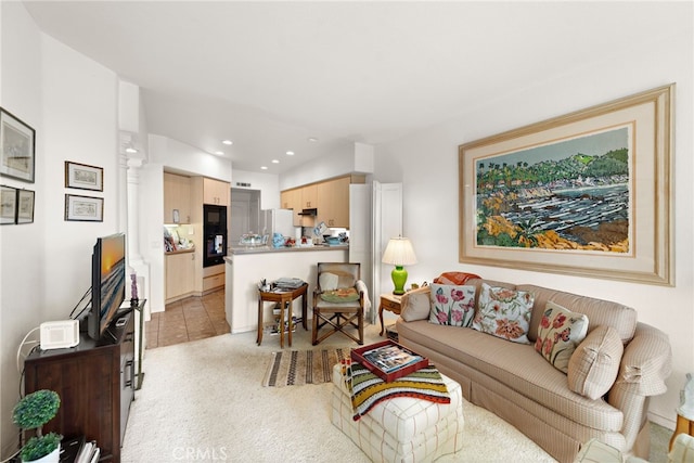 living room featuring light colored carpet