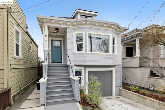 view of front of property featuring a garage