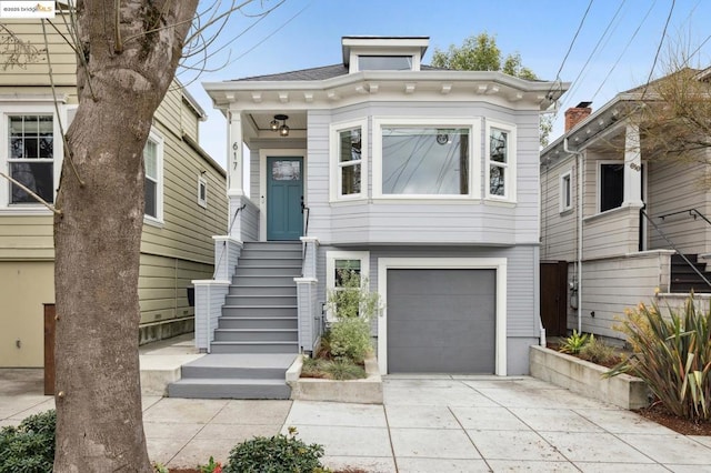 view of front of property featuring a garage