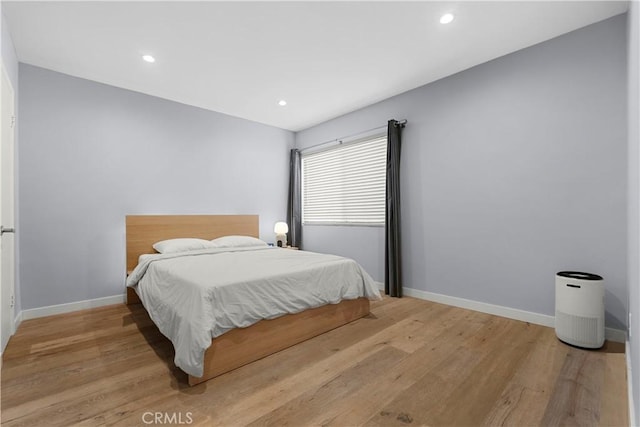 bedroom featuring light wood-type flooring