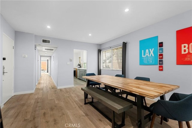 dining area featuring light hardwood / wood-style floors