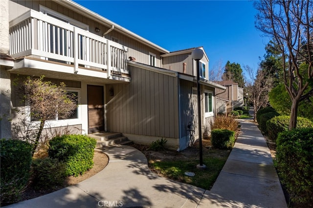 view of home's exterior featuring a balcony