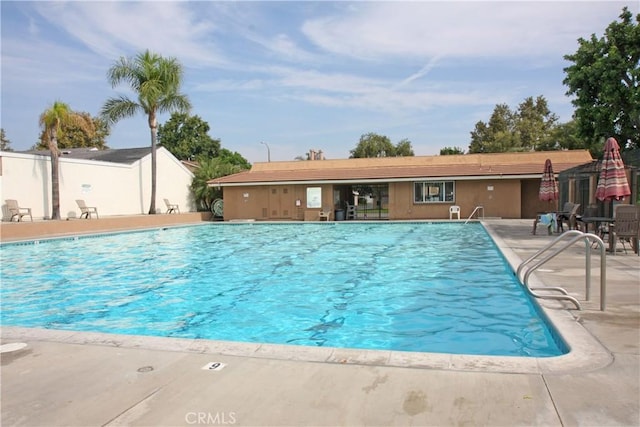 pool with a patio area