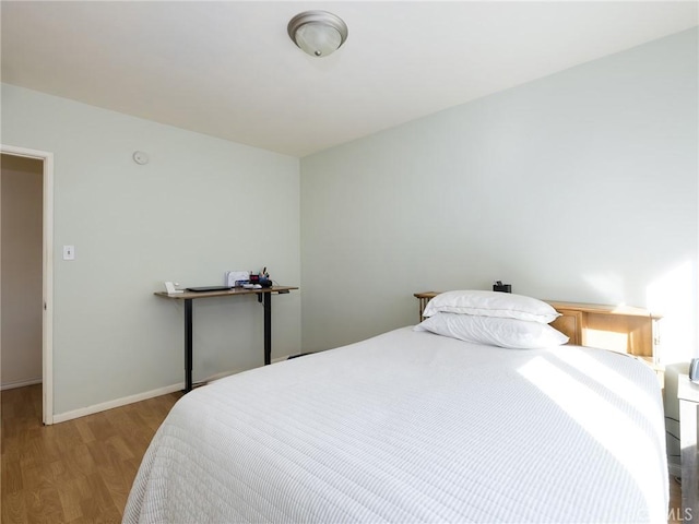 bedroom featuring light wood-type flooring