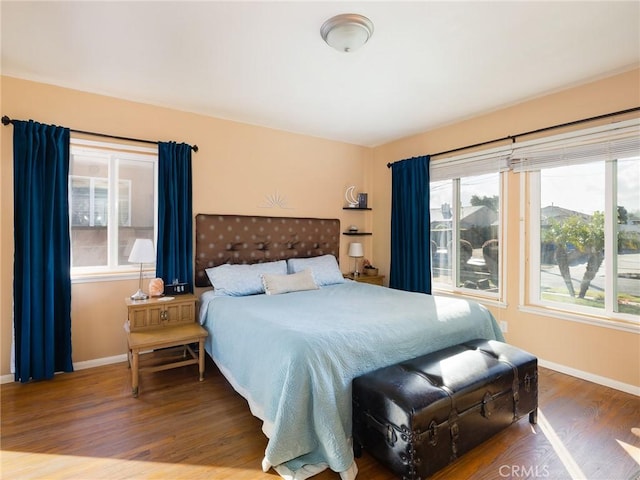 bedroom with hardwood / wood-style floors