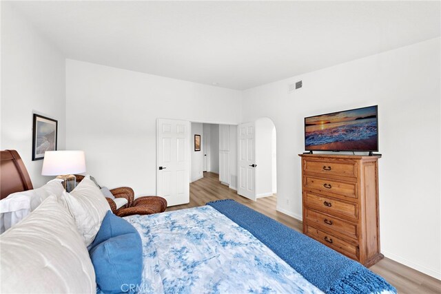 bedroom with wood-type flooring