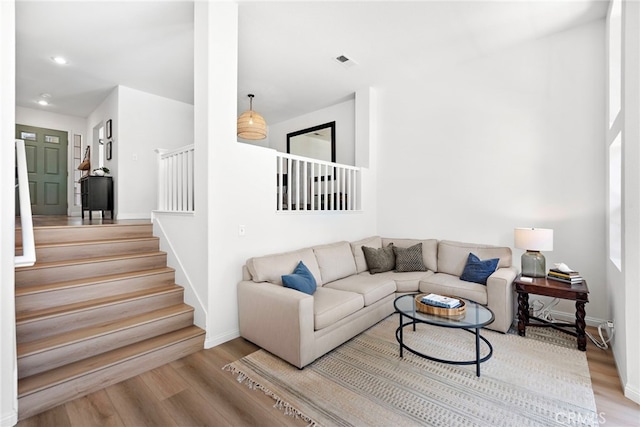 33144 Ocean Rdg, Dana Point, CA 92629 - living room featuring wood finished floors, stairs, baseboards, and recessed lighting