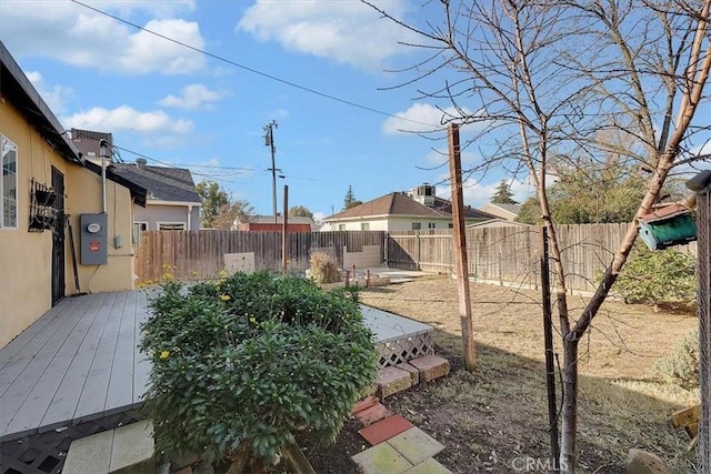 view of yard with a deck