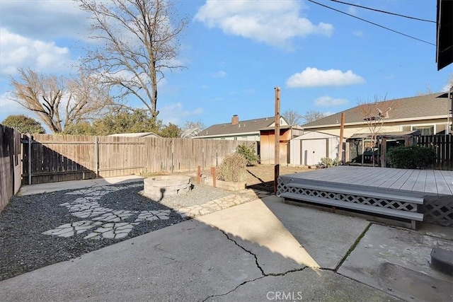 view of patio / terrace featuring a storage shed