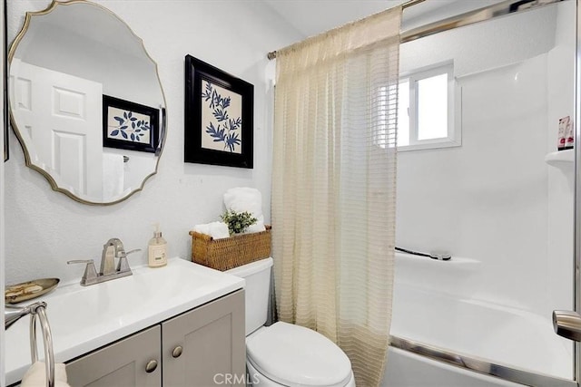 full bathroom with vanity, shower / bathtub combination with curtain, and toilet