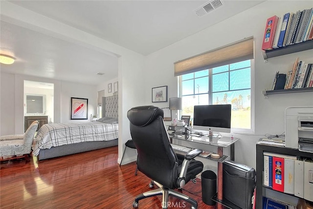 office area with dark wood-type flooring