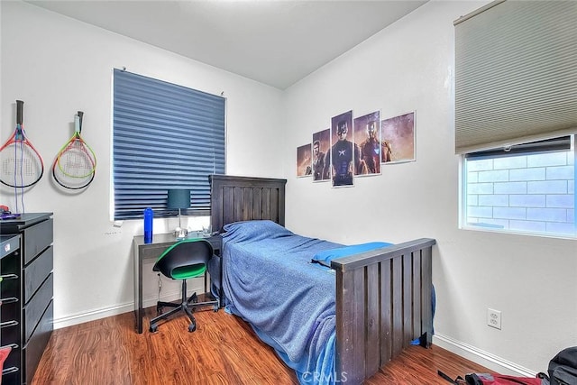 bedroom featuring hardwood / wood-style floors