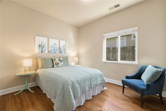 bedroom featuring hardwood / wood-style floors