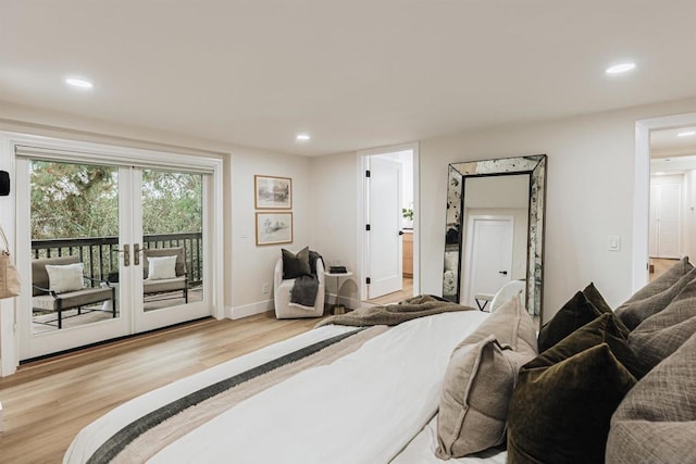 bedroom with french doors, light hardwood / wood-style flooring, and access to outside