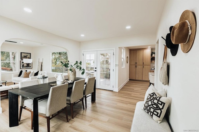 dining area with light hardwood / wood-style flooring