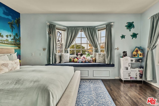 bedroom featuring dark wood-type flooring