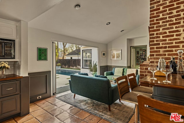 living room with lofted ceiling