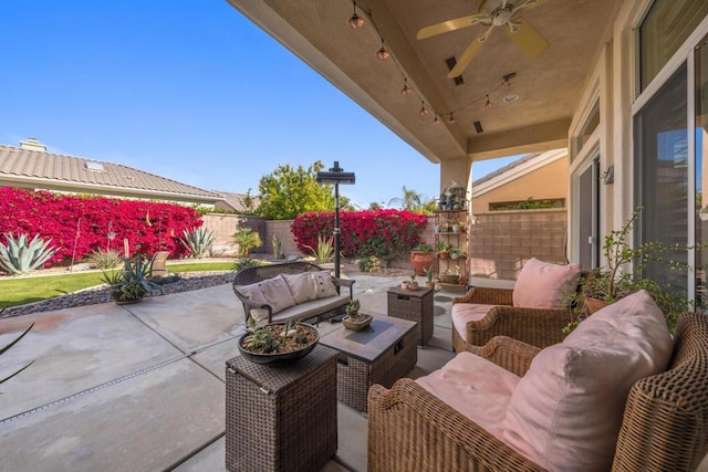 view of patio featuring an outdoor hangout area and ceiling fan