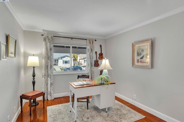 office featuring crown molding and hardwood / wood-style floors